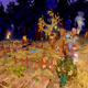 Screenshot of a village and farm in Tree of Life, taken from the store page.